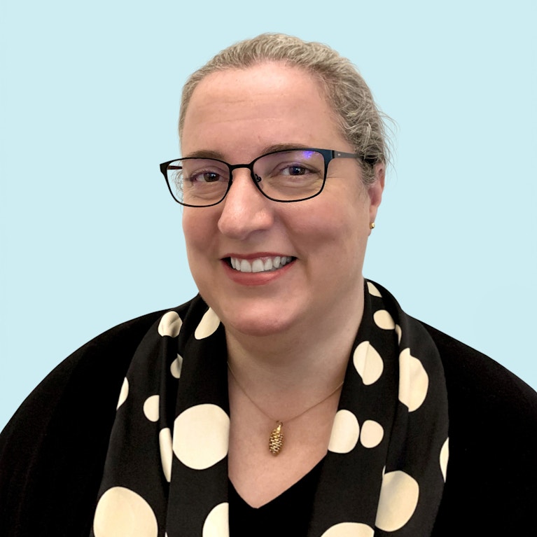 Portrait of Sara on blue background