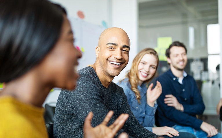 Business team smiling during a meeting