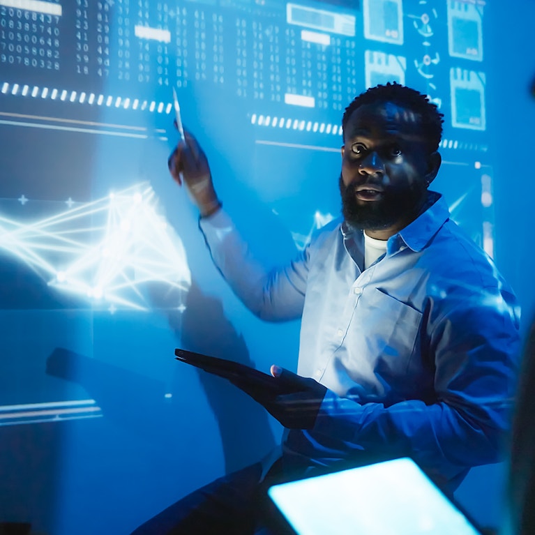 Artificial Intelligence developer team meeting at night