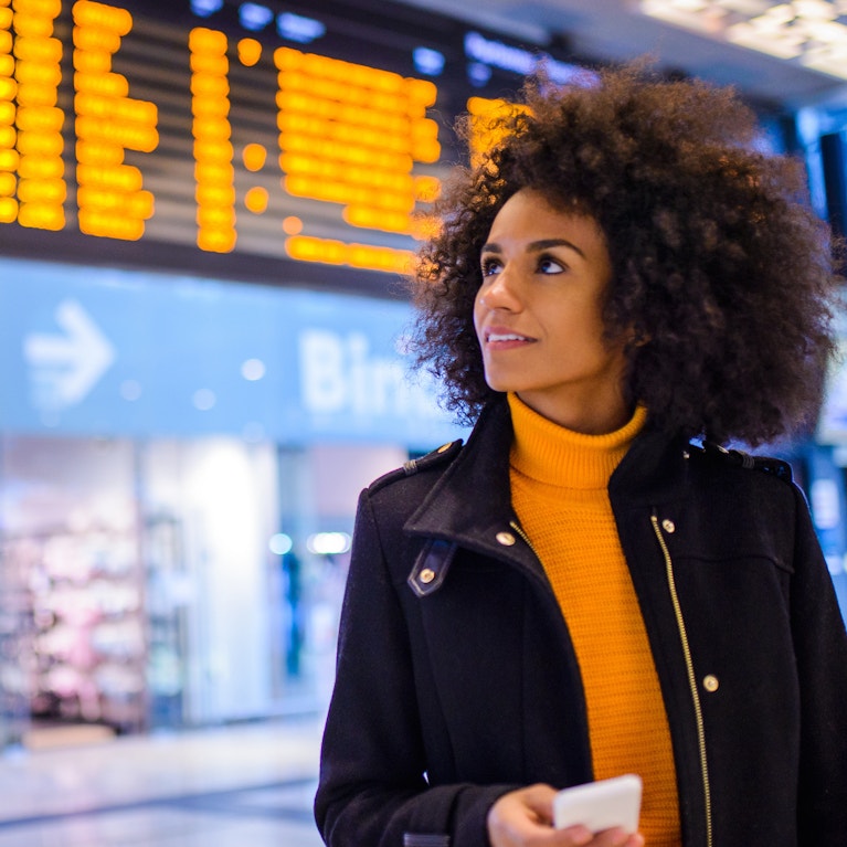 Woman in rail station