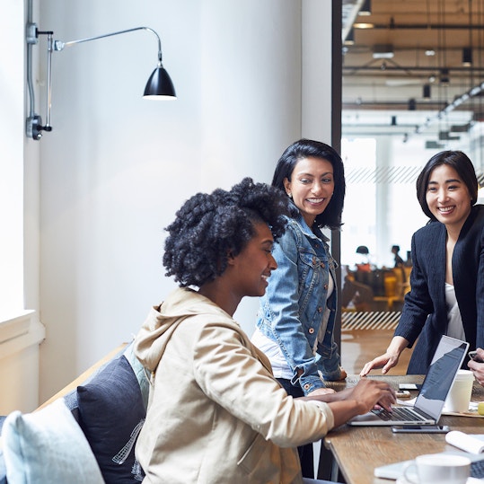 colleagues working together in an office space