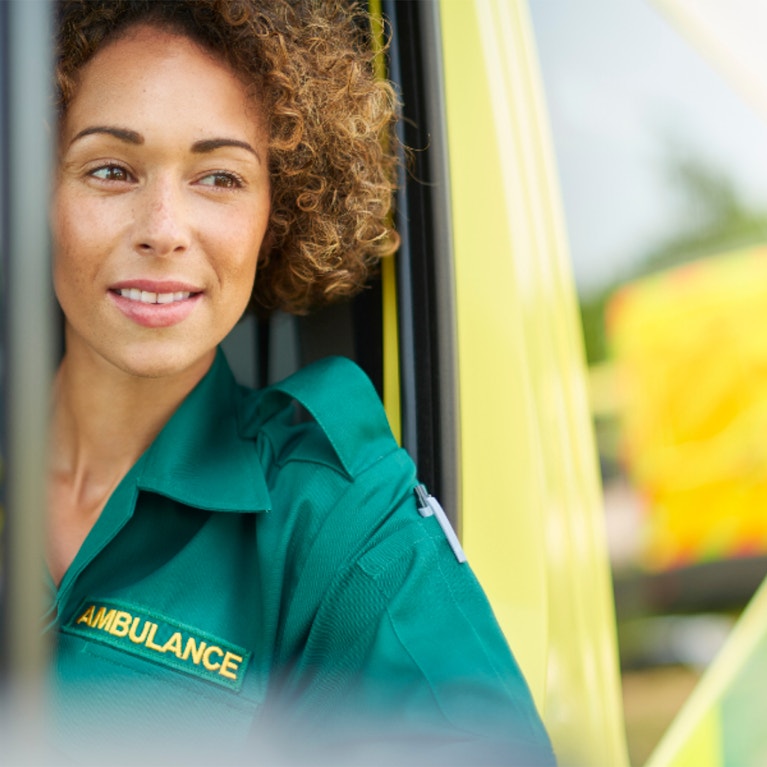 Ambulance driver in vehicle