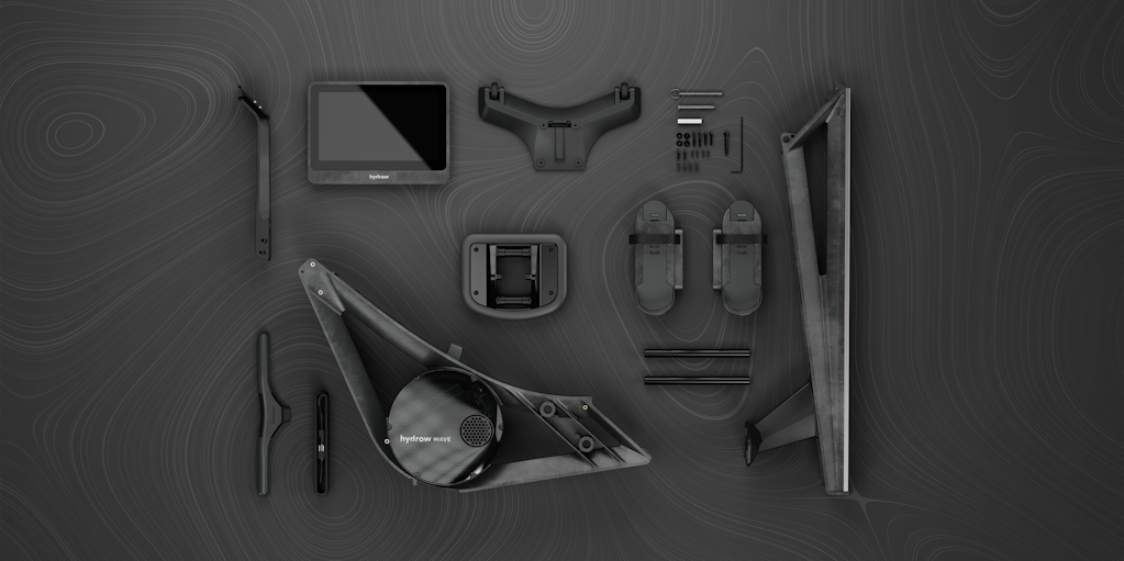 Rendering of separate components of the Hydrow Wave laying next to each other on a textured surface